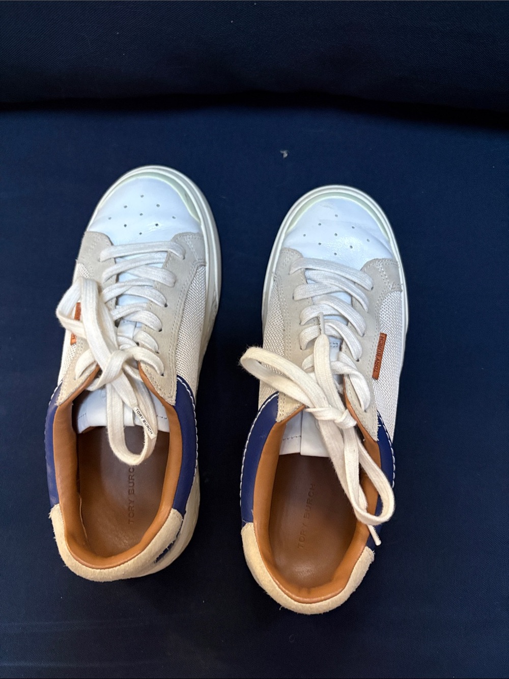 Tory Burch White, Beige & Navy Lace-Up Ladybug Sneakers.